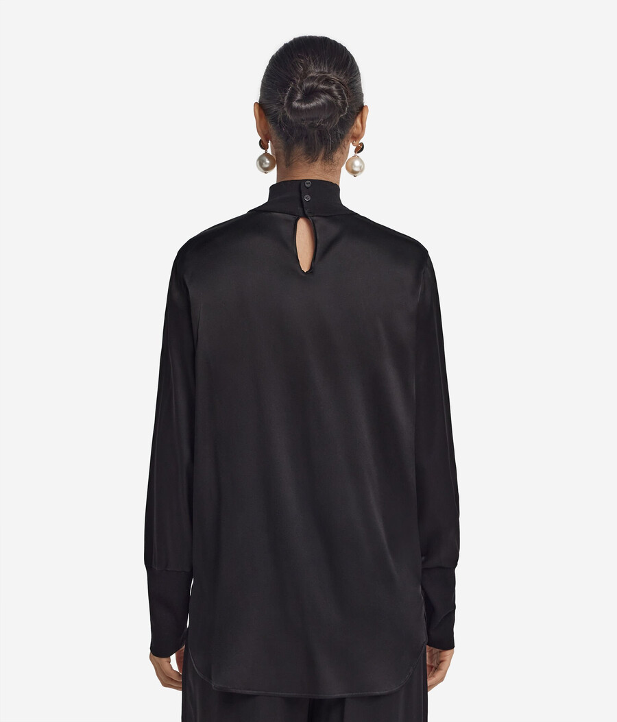 sidensatinblus med jerseyinlägg