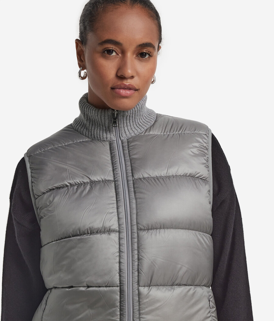 vändbar bouclé och nylon gilet
